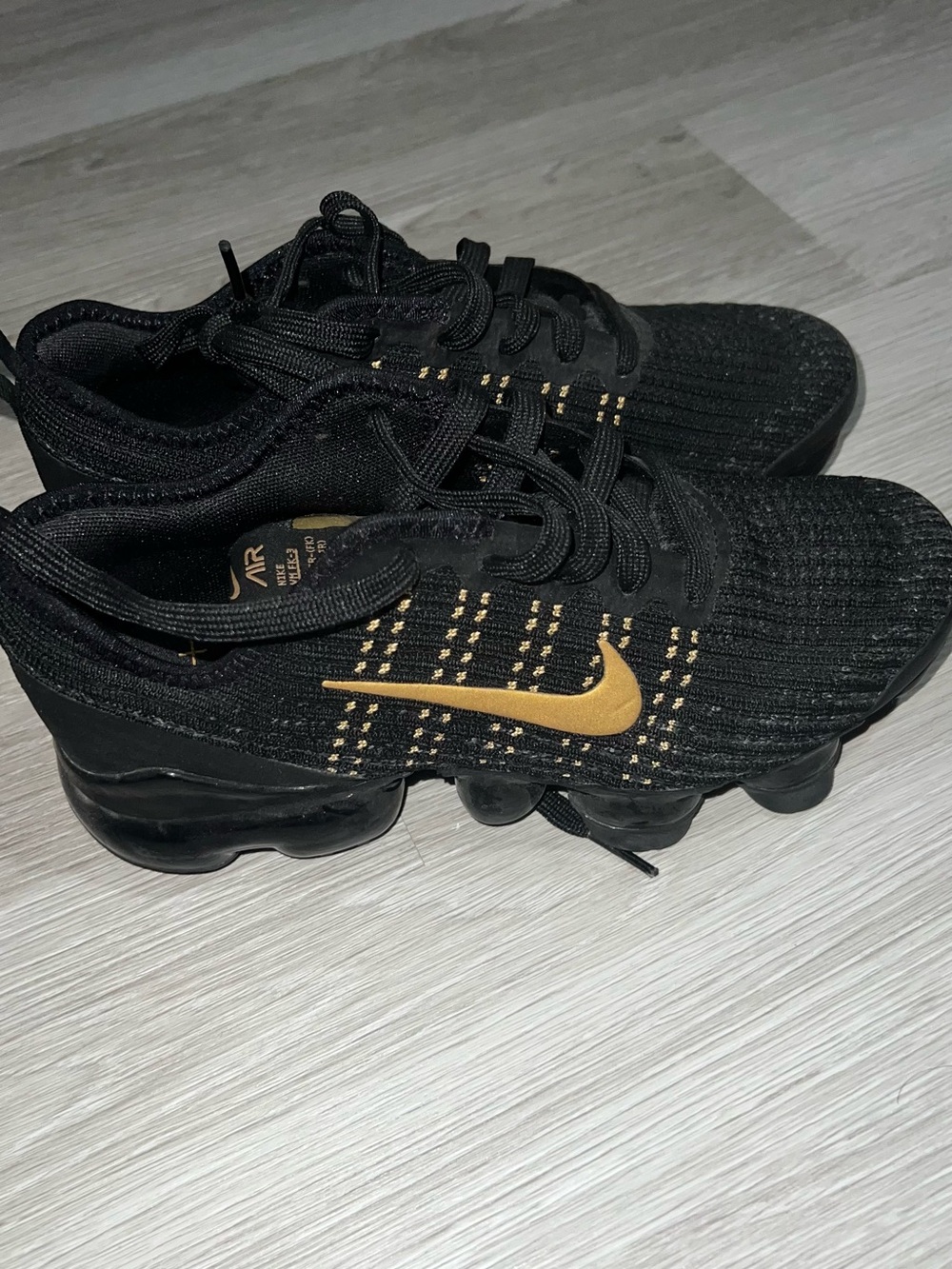 Nike ACG Kids Black Sneakers with Gold Swoosh